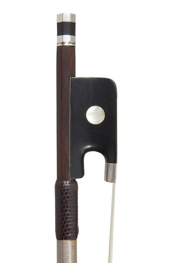 A SILVER-MOUNTED CELLO BOW DOMINIQUE PECCATTE (Mirecourt, b 1810; d 1874)