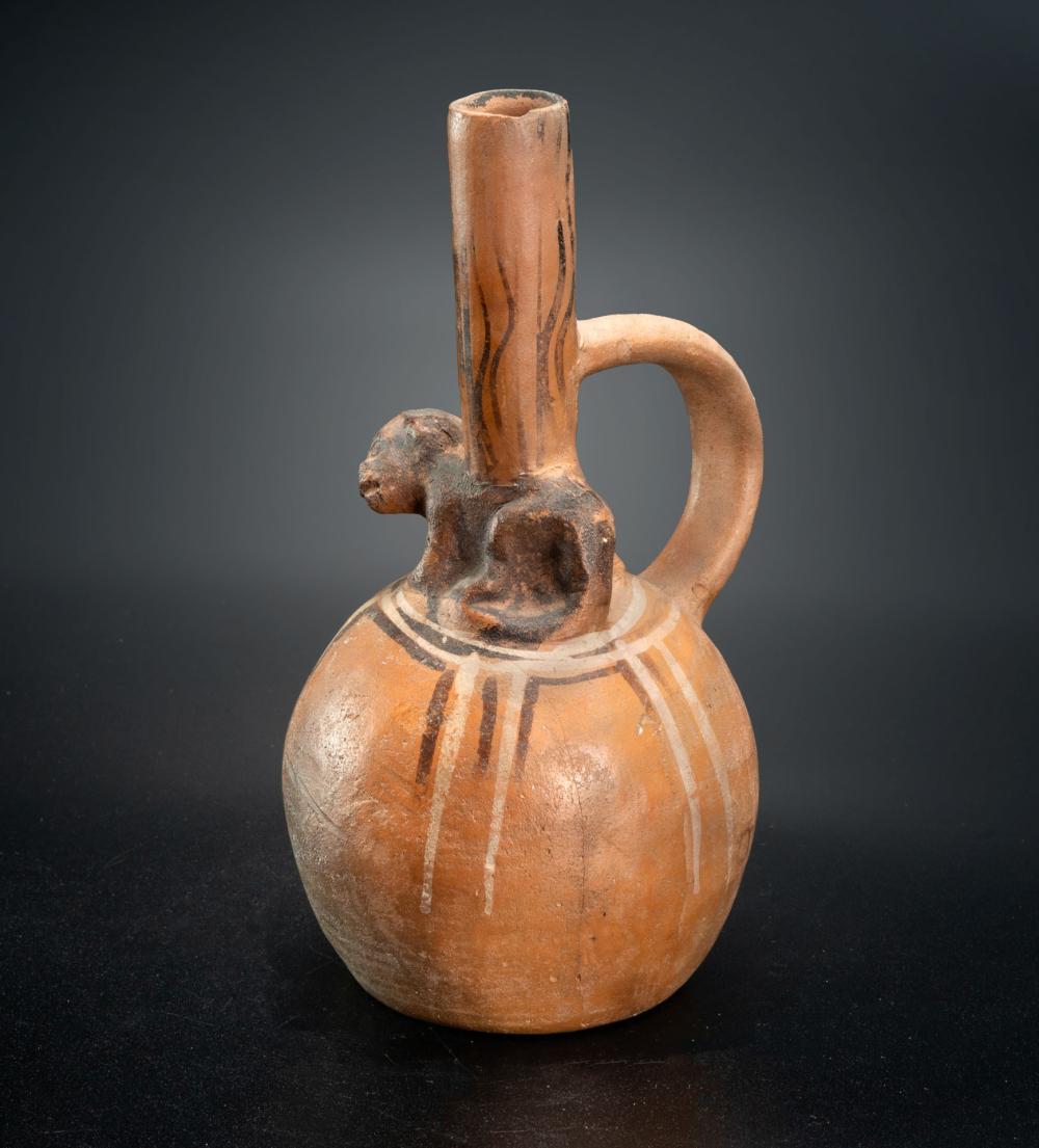 A Spout and Stirrup Bottle Ornamented with a Sculpted Monkey Effigy