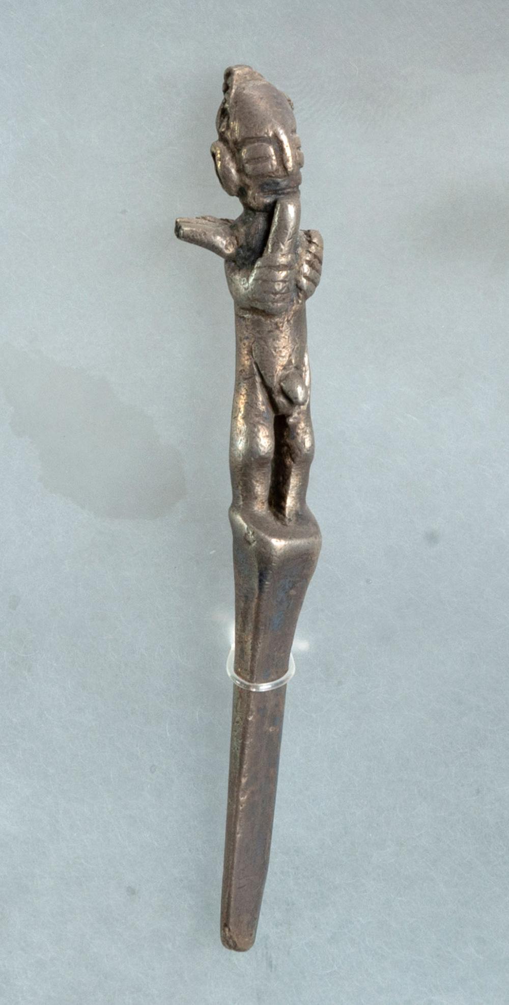 A Silver Spatula with Man Figurine, Chimu, Peru, 900-1470 CE