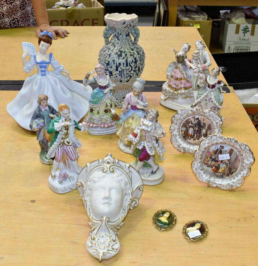 Collection of assorted pottery figurines