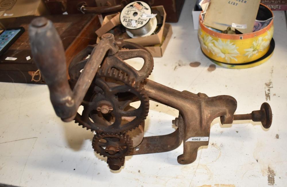 Vintage mechanical operated bench grinder.