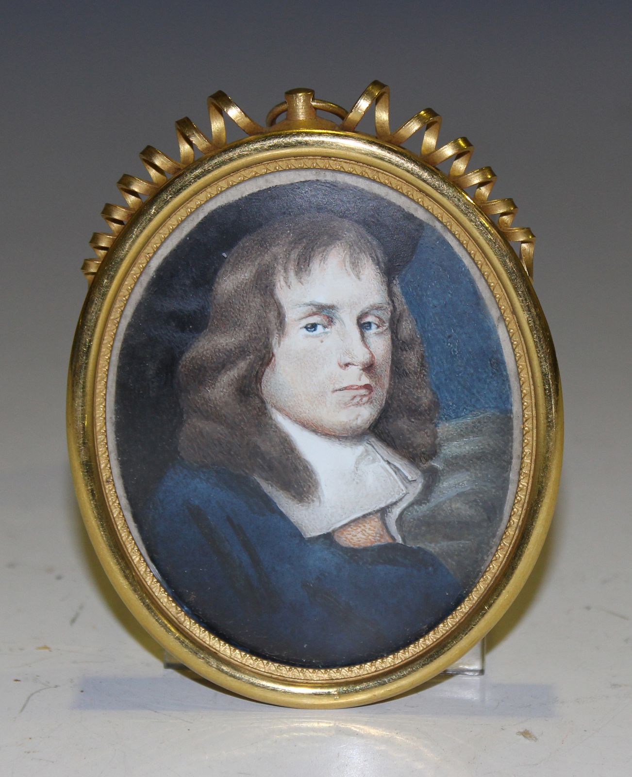 AFTER SAMUEL COOPER - OVAL MINIATURE PORTRAIT OF A GENTLEMAN
