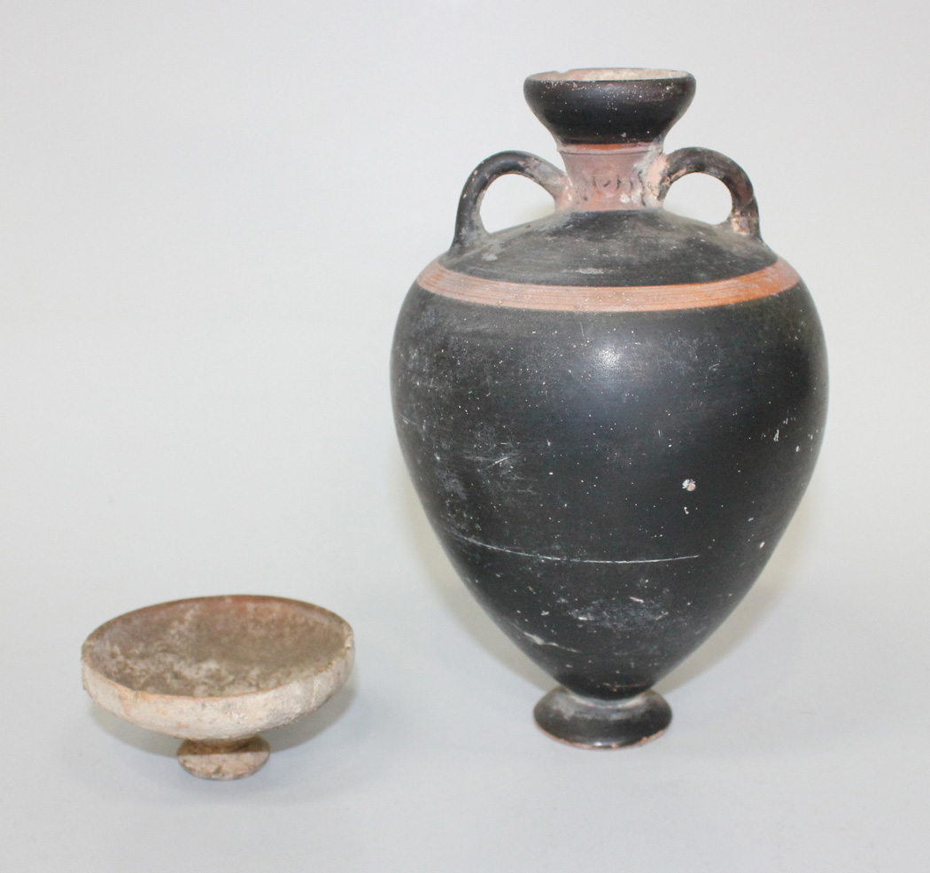 AN ANTIQUE TERRACOTTA AMPHORA