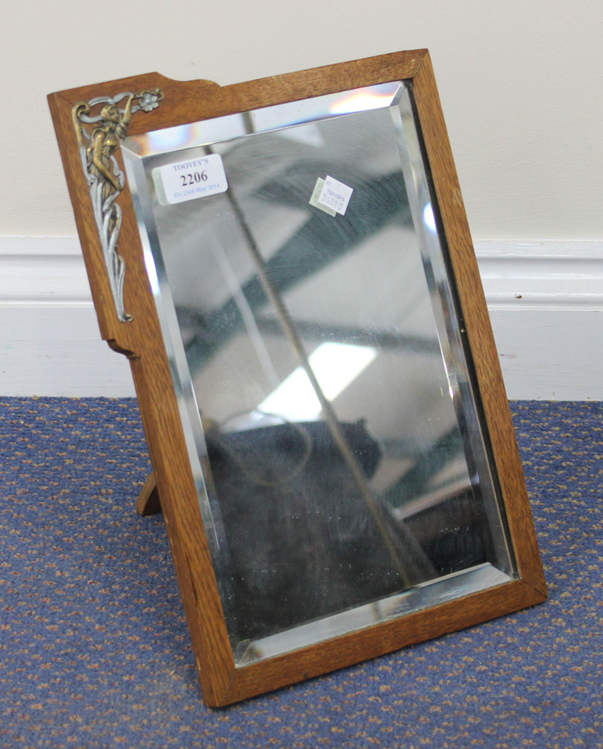 AN ART NOUVEAU OAK DRESSING TABLE MIRROR
