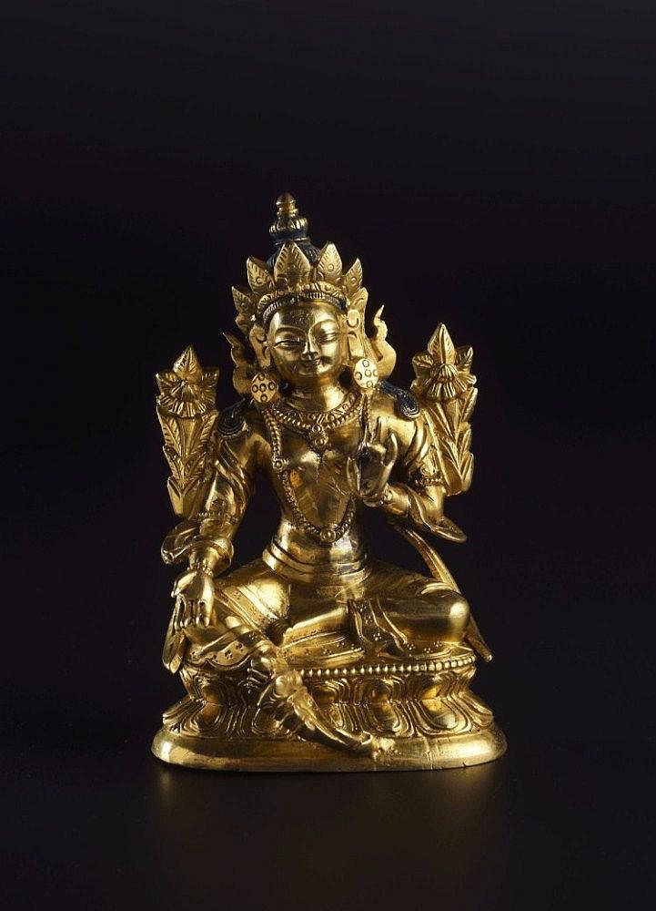 A GILT-BRONZE FIGURE OF GREEN TARA