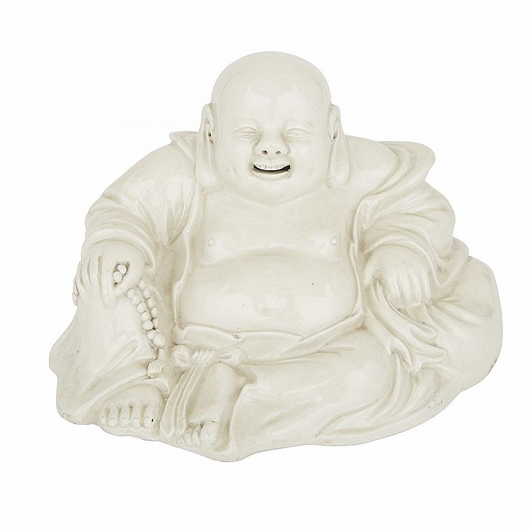 A Chinese Dehua Blanc de Chine Budai
