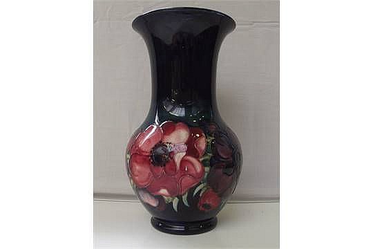 Moorcroft pottery vase, baluster form, tube line in the Anemone pattern aga