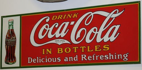 1931 coca-cola embossed tin sign