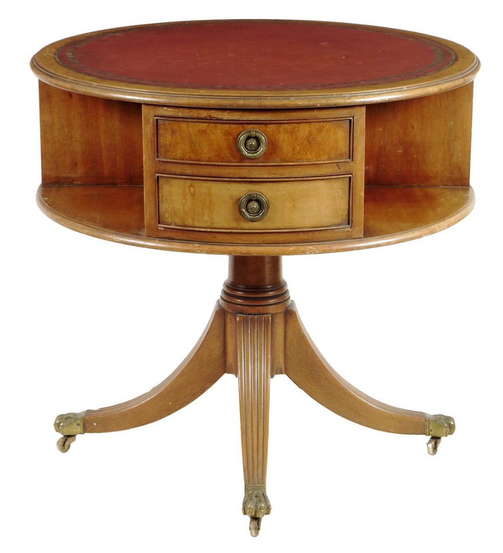 A mahogany drum library table in Regency style