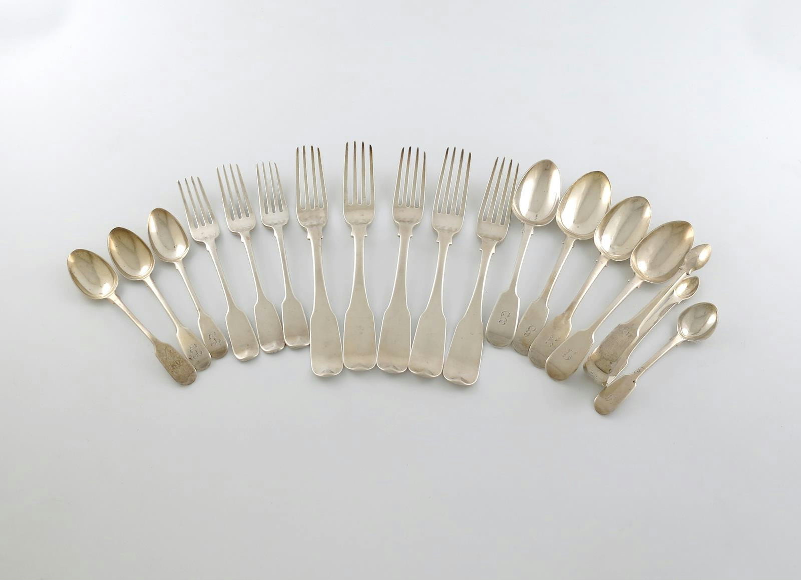 A mixed lot of antique silver Fiddle pattern flatware