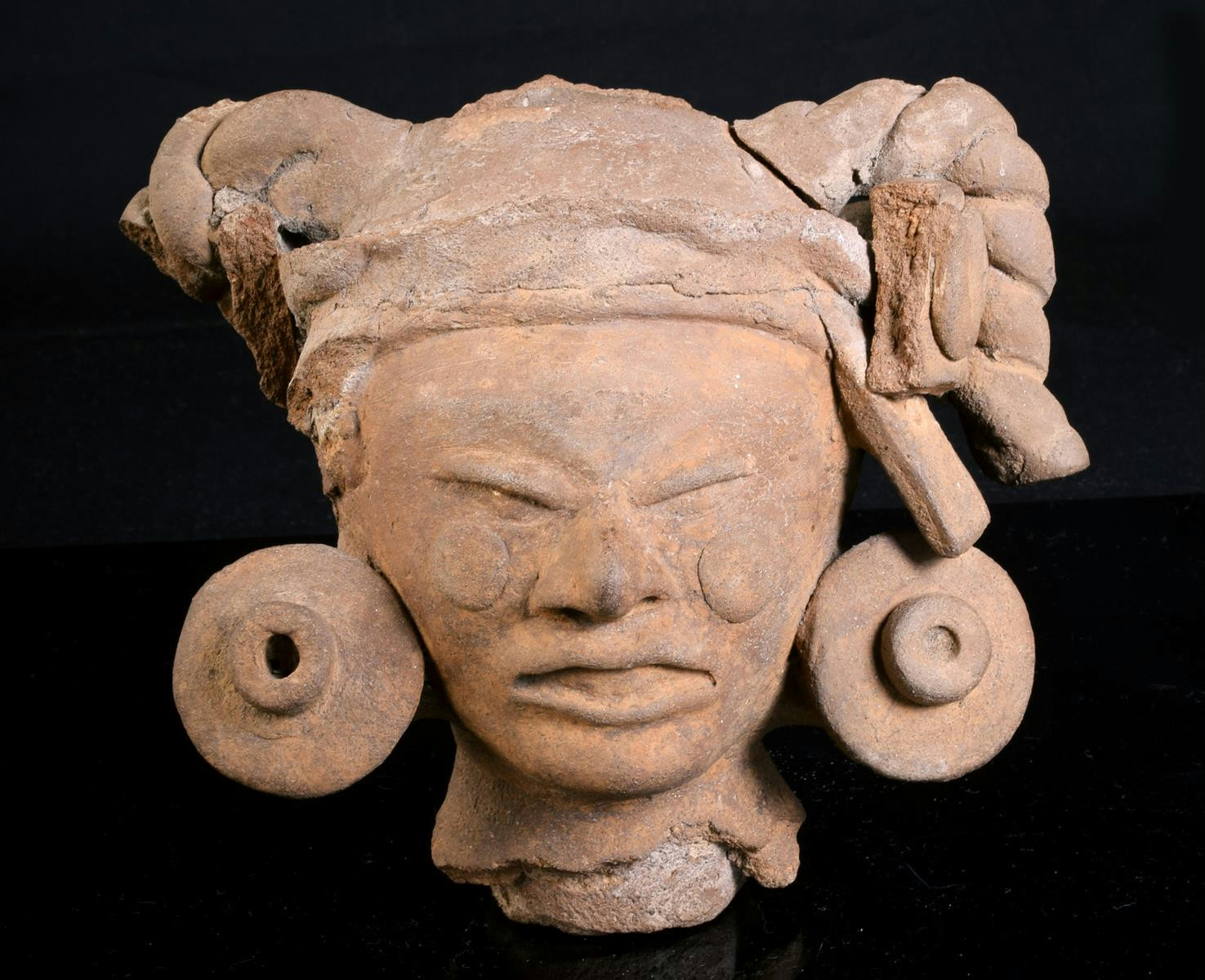 A Mayan pottery head fragment