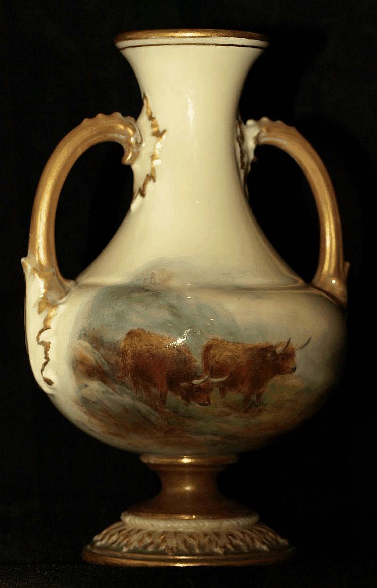 A Royal Worcester hand painted twin handled vase