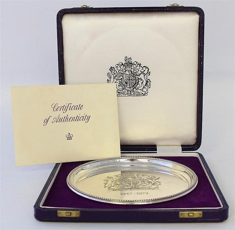 A commemorative limited edition silver salver Com
