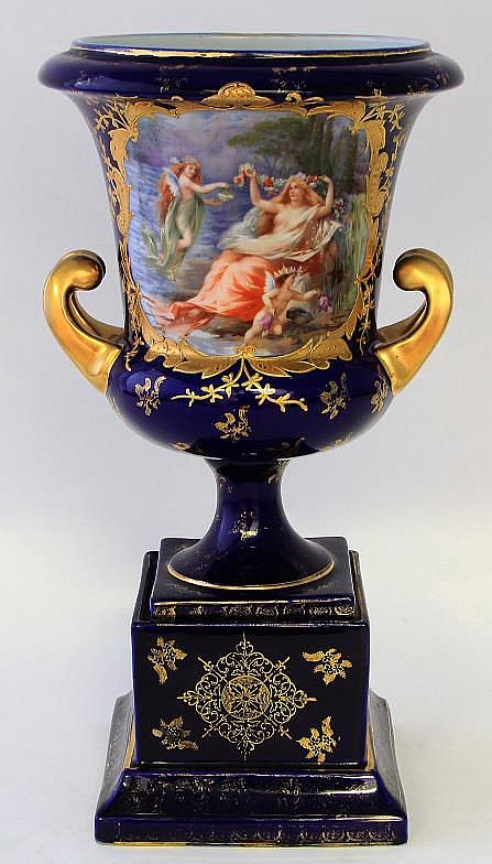A large and impressed Vienna porcelain twin handle