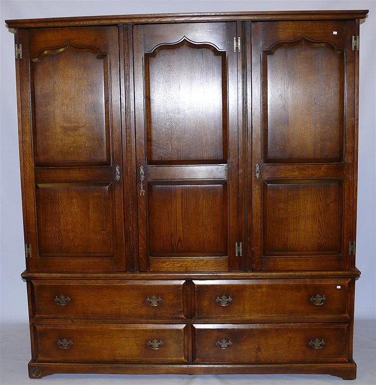 A Georgian style oak wardrobe, Royal Oak range, Ar