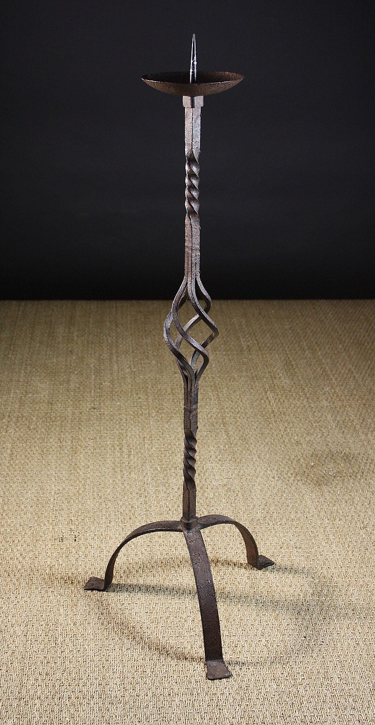 A 19th Century Wrought Iron Pricket Candlestick.