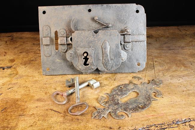 A Large 16th/17th Century Polished Iron Door Lock with...