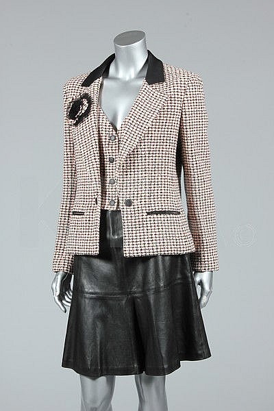 A Chanel boutique pink and black tweed jacket with
