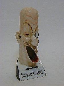 A NOVELTY MATCH HOLDER