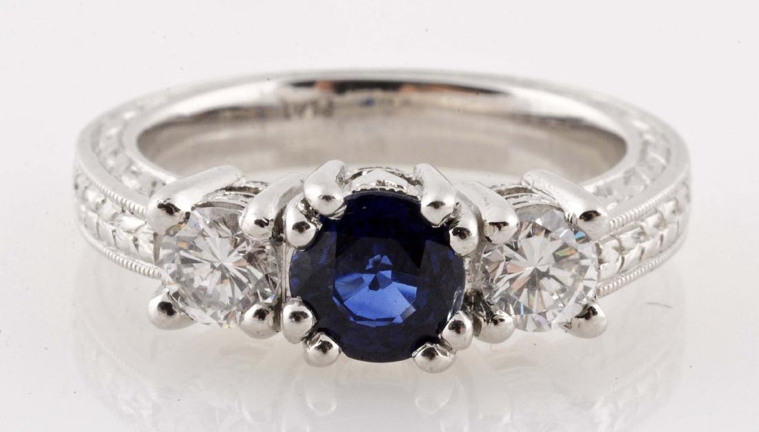 11.2g Platinum 0.75ct Natural Sapphire & Diamond Ring.