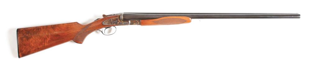 (C) L.C. SMITH SIDE BY SIDE 12 GAUGE SHOTGUN.