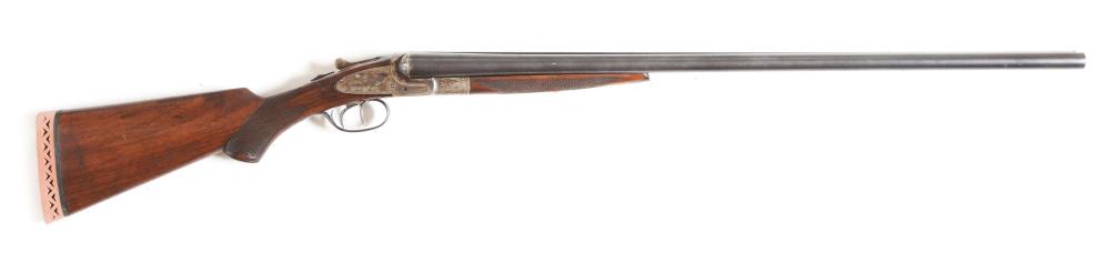 (C) L. C. SMITH IDEAL GRADE SIDE BY SIDE SHOTGUN IN 12 BORE.