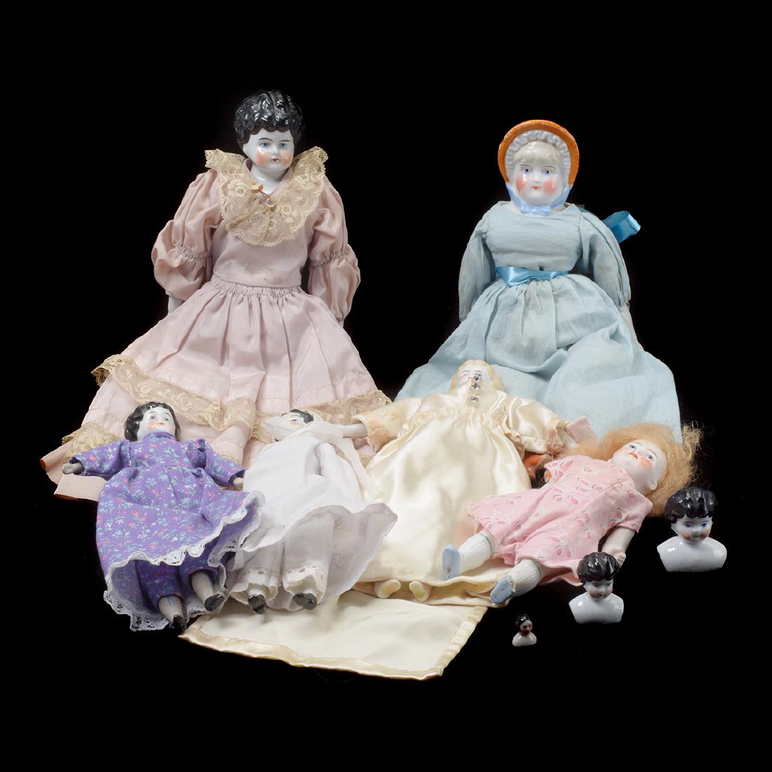 Five China Head Dolls and Heads, and Bisque Doll