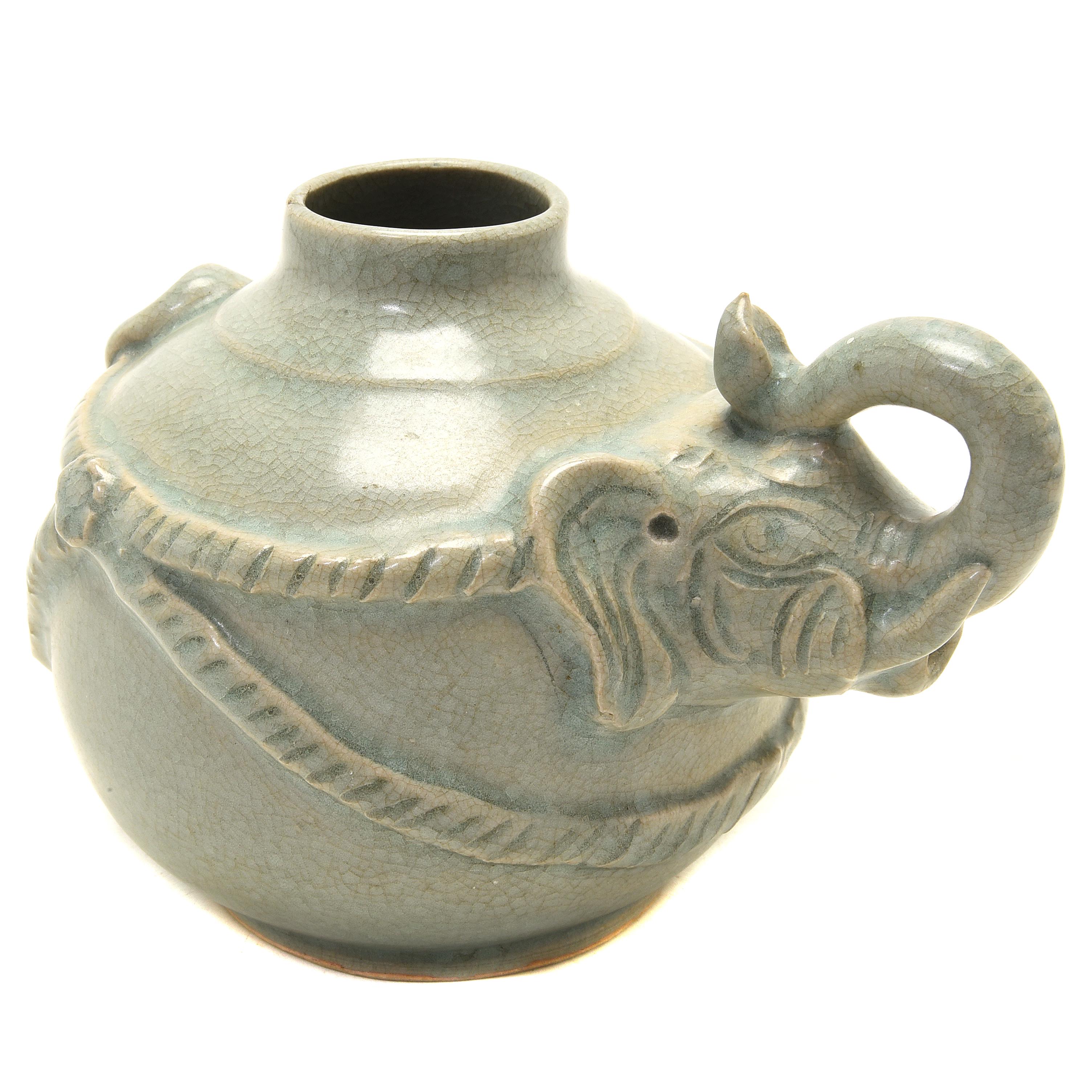 Chinese Celadon Glazed Elephant Head Handle Ewer