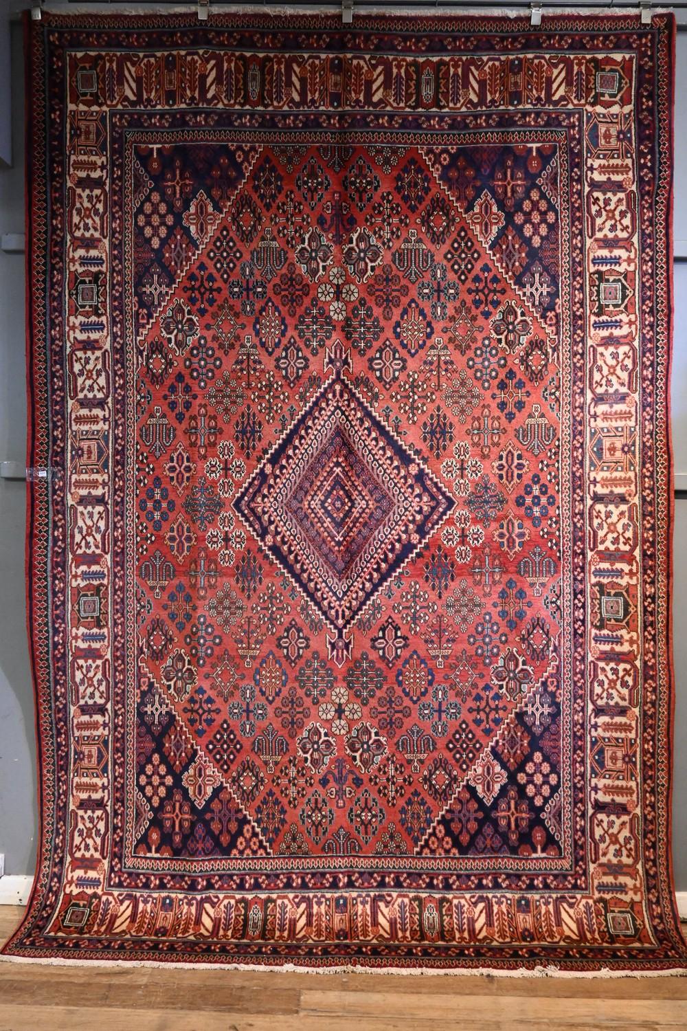 A PERSIAN JOSHAGAN RUG