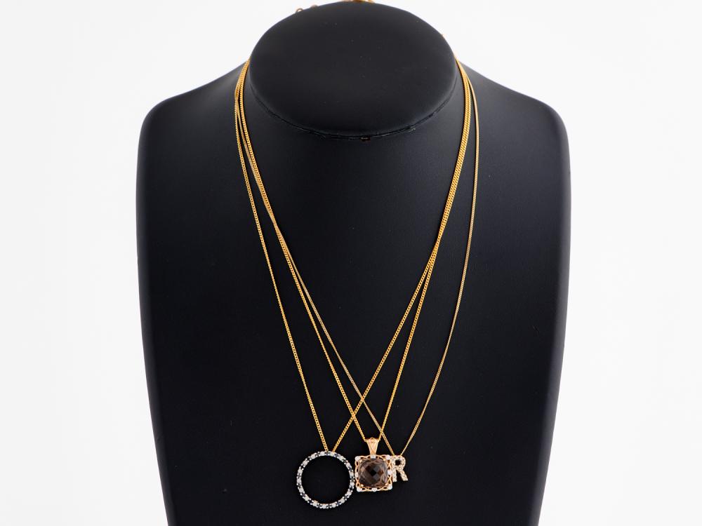 THREE DIAMOND AND GEM SET PENDANTS IN 9CT GOLD