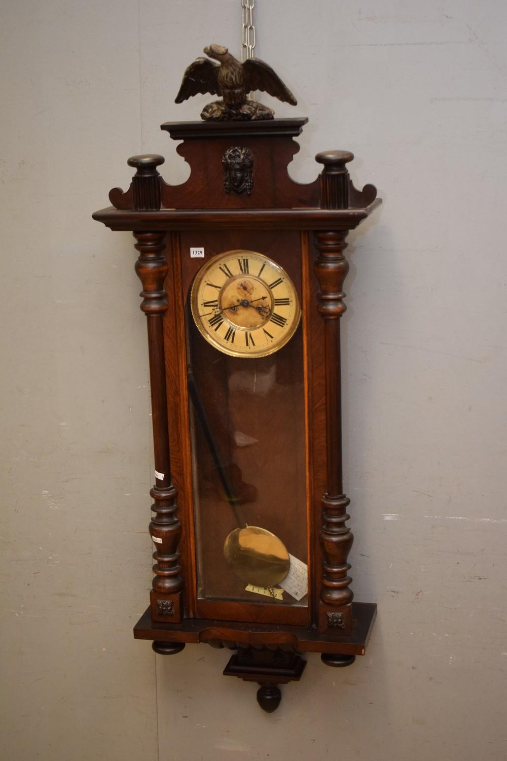 A FINELY CARVED VIENESE TWIN WEIGHT REGULATOR WALL CLOCK...