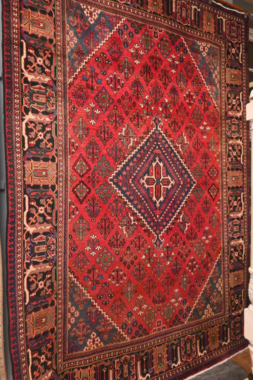 A PERSIAN JOSHAGAN RUG