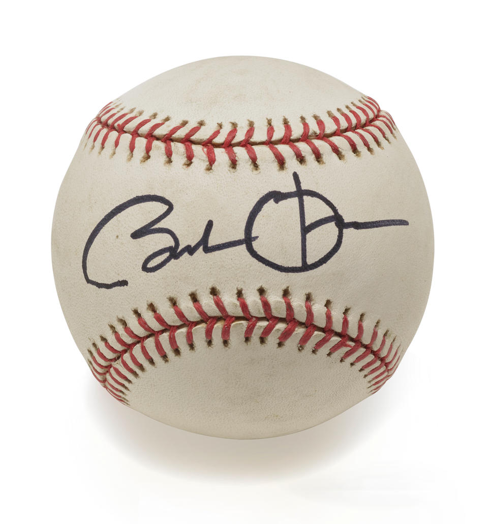 A BASEBALL SIGNED BY BARACK OBAMA