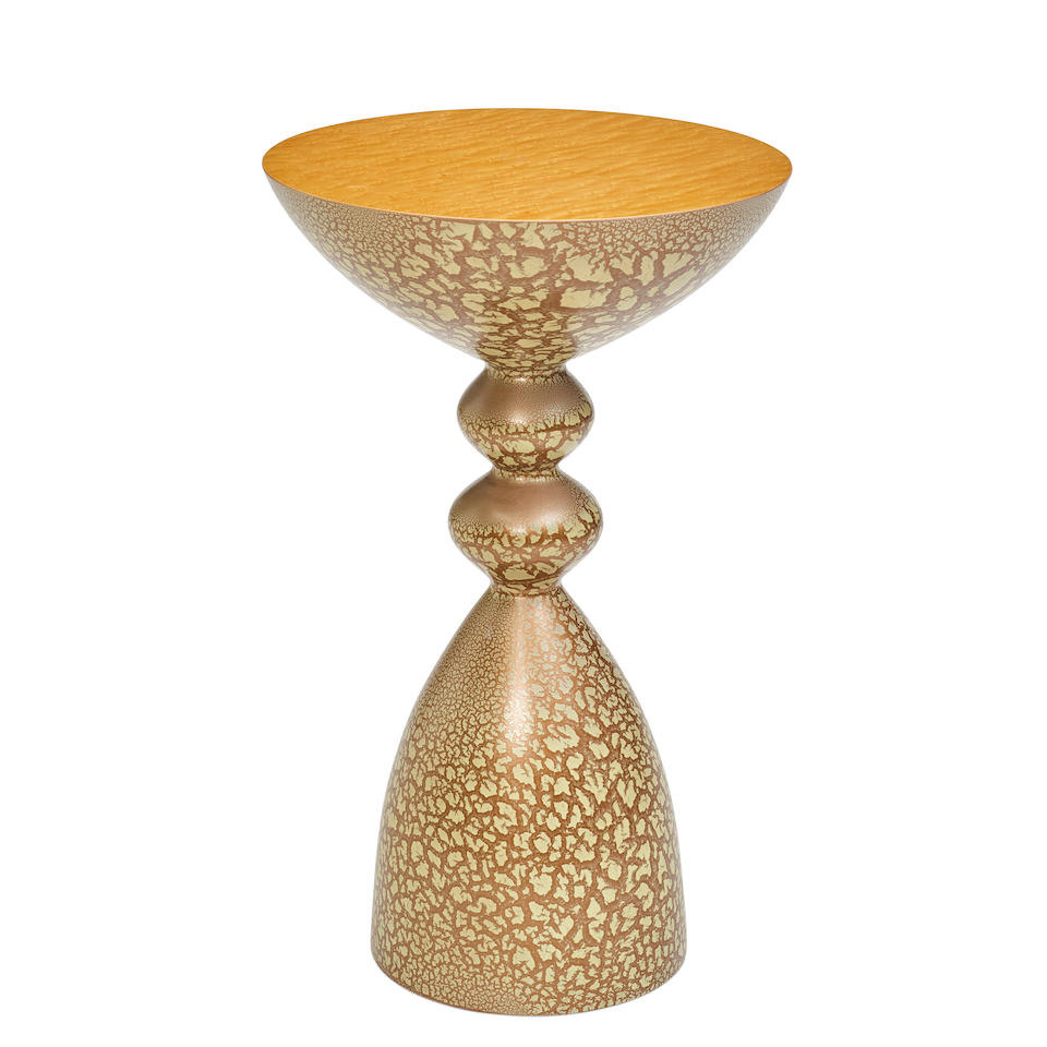 A WENDELL CASTLE COLLECTION "SNAP" SIDE TABLE
