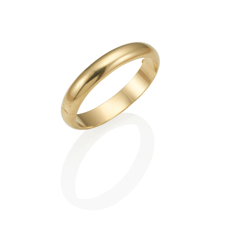 TIFFANY AND CO.: A GOLD HINGED BANGLE