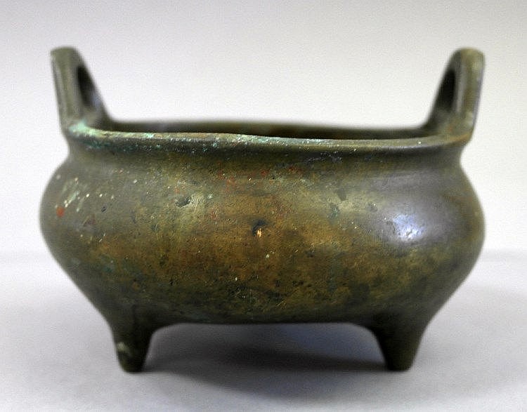 A Chinese bronze tripod censer 19th century The