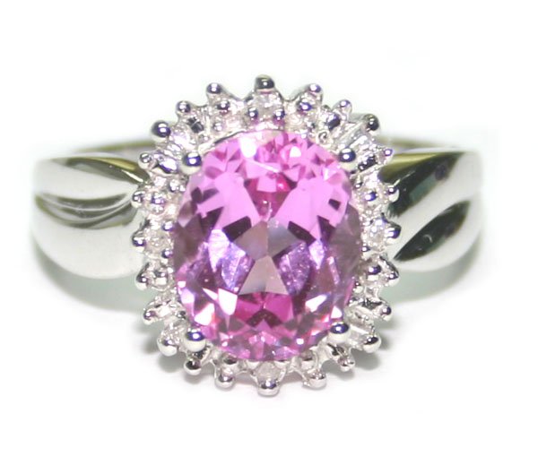 3657: 3.50 CT DIA & PINK TOPAZ 10KT  GOLD  RING
