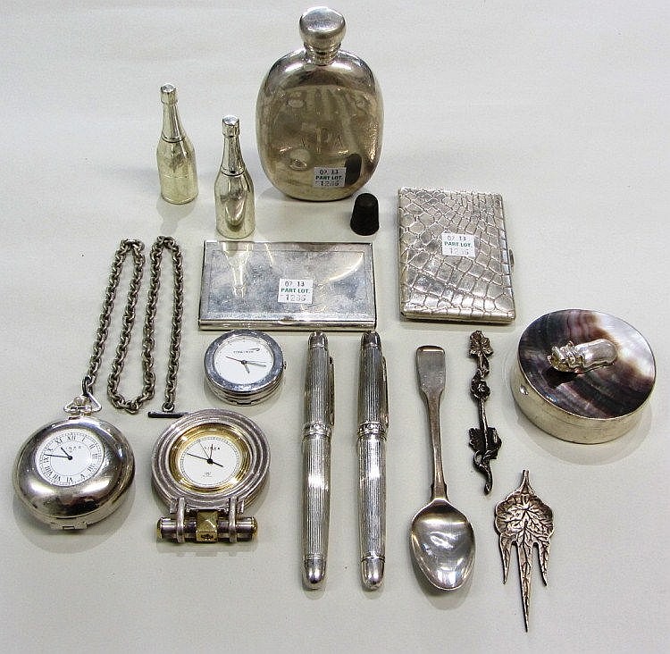 A silver circular hinge lidded trinket box, the