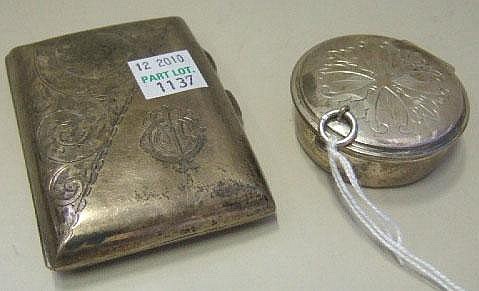 A silver circular hinge lidded Pyx box, the cover