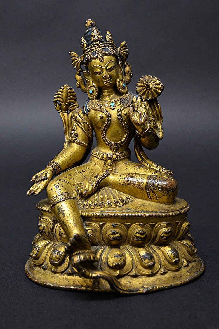A good Tibetan gilt-bronze figure of Green Tara