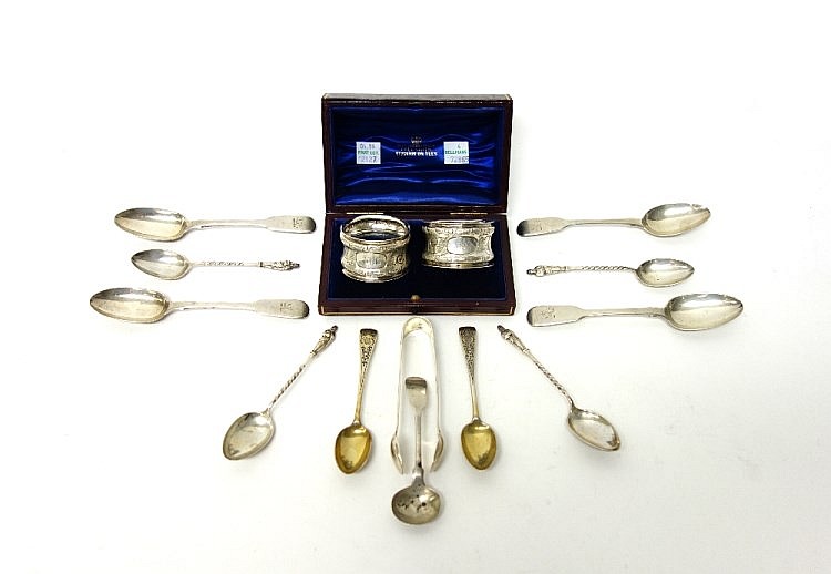 Silver, comprising; a pair of late Victorian napkin rings, with scrolled de