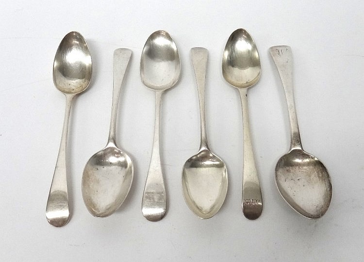 Six silver Old English pattern dessert spoons, various dates, combined weig