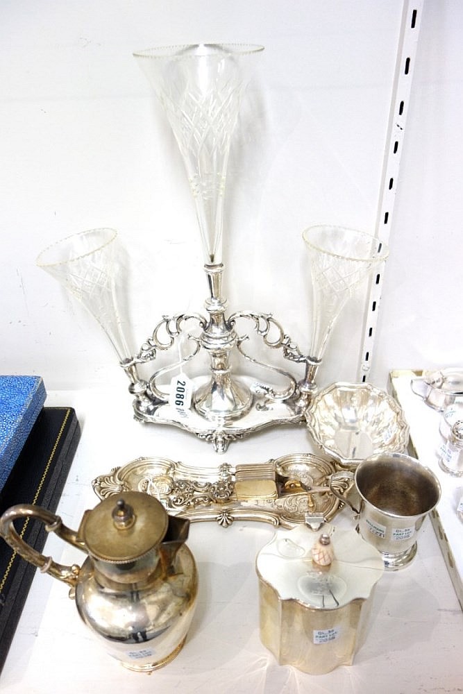 Plated wares, comprising; a table centrepiece stand, fitted with three face