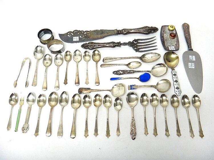 Silver, comprising; twelve teaspoons, with a matching pair of sugar tongs a