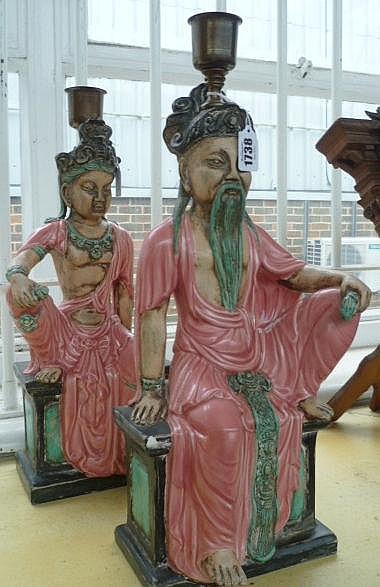 A pair of part glazed earthenware novelty lamps