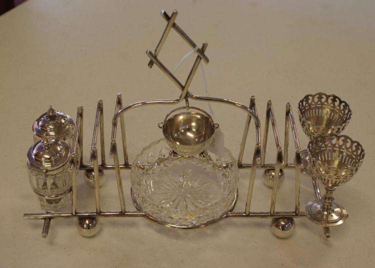 Victorian silver plated cruet in Christopher Dresser style, 29cm long approx.