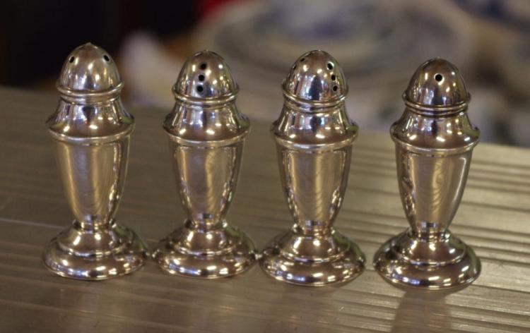 Two pairs of sterling silver salt & peppers stamped sterling