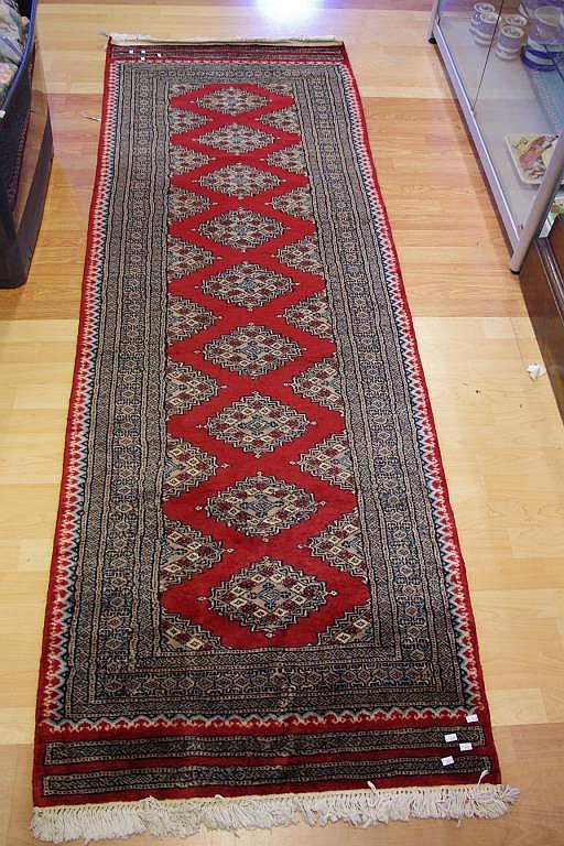 Pakistani hand knotted wool hall runner rug with