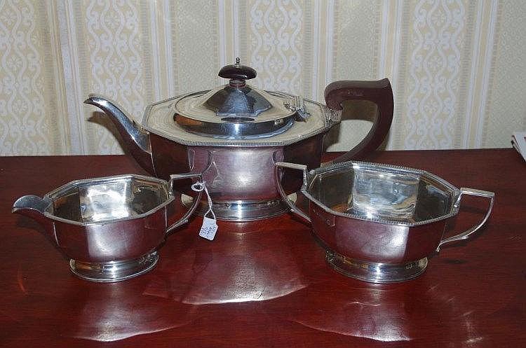Three piece sterling silver tea service comprising
