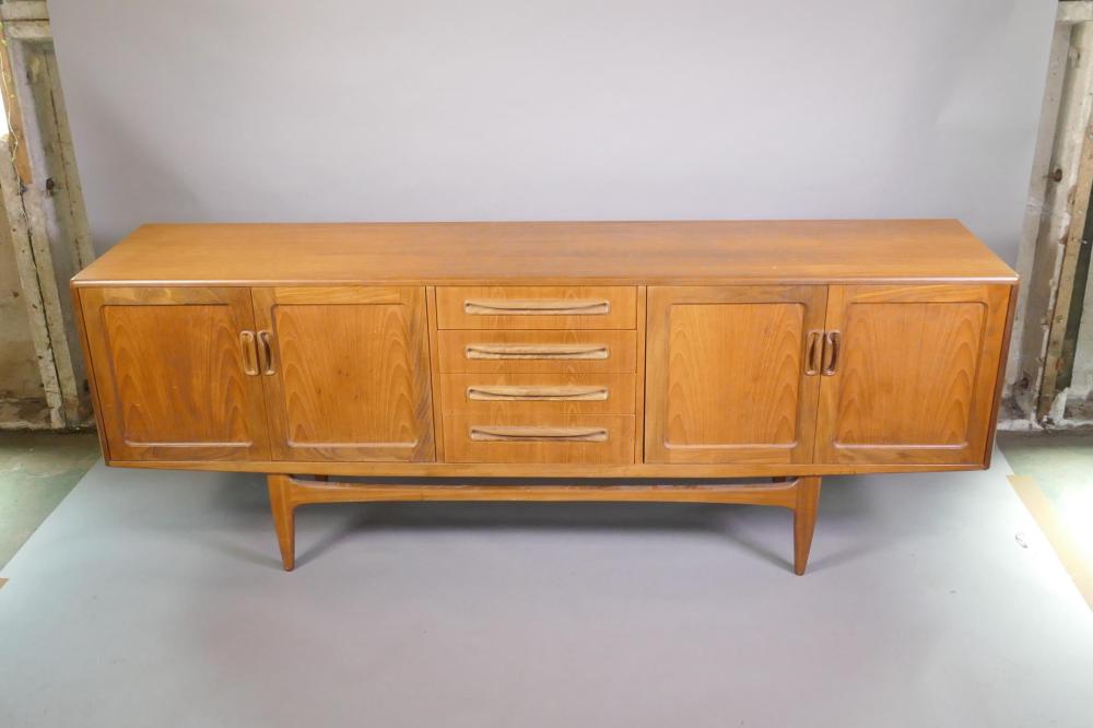 A mid C20th G-Plan 'Fresco' teak sideboard with a flight...
